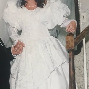 Used Demetrious wedding gown & head piece Boxed together & preserved. Sold as is